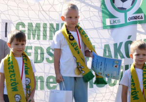 34 Chłopcy z czterolatków na podium