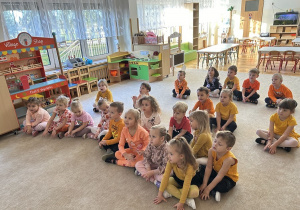 Zabawa muzyczno-ruchowa na dywanie.