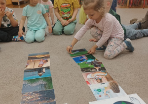 10 Dziewczynka kładzie ilustarcję